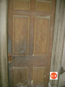 Grained door on second floor
