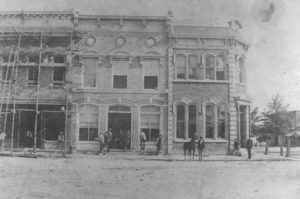 This unique photograph shows the construction of 108 East Benson, circa 1890.