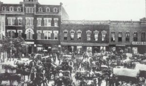 East Benson showing the newly completed Masonic Temple and storefronts 116,114, 112/110, and part of 102, circa 1890.
