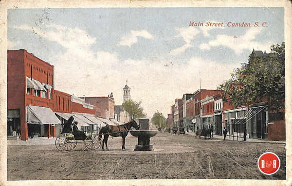 Early postcard view of Broad Street with the water fountain for livestock.  Courtesy of the AFLLC Collection - 2017