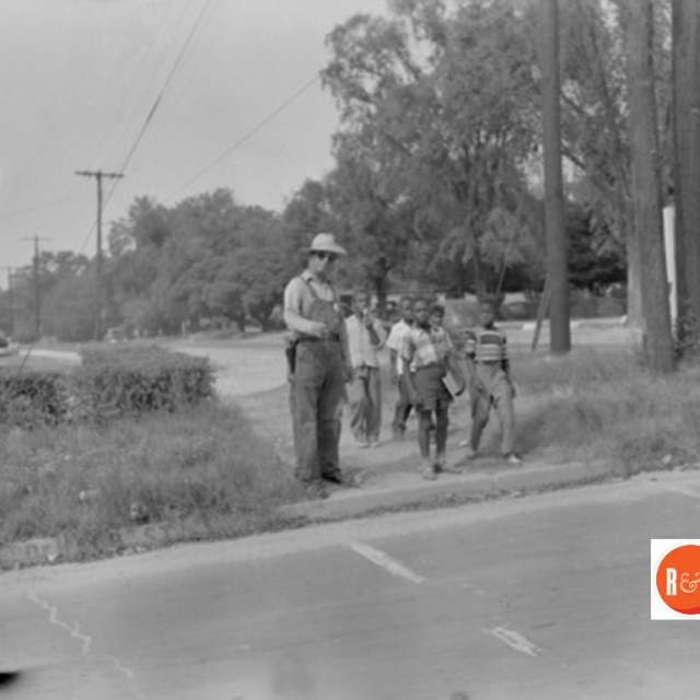 Helping students safely cross the street.  Courtesy of the Camden A&M (Monarch Collection) 1950s
