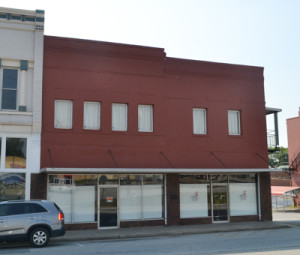 Commercial establishments photographed by R&R adjoining the hardware company building in 2014.