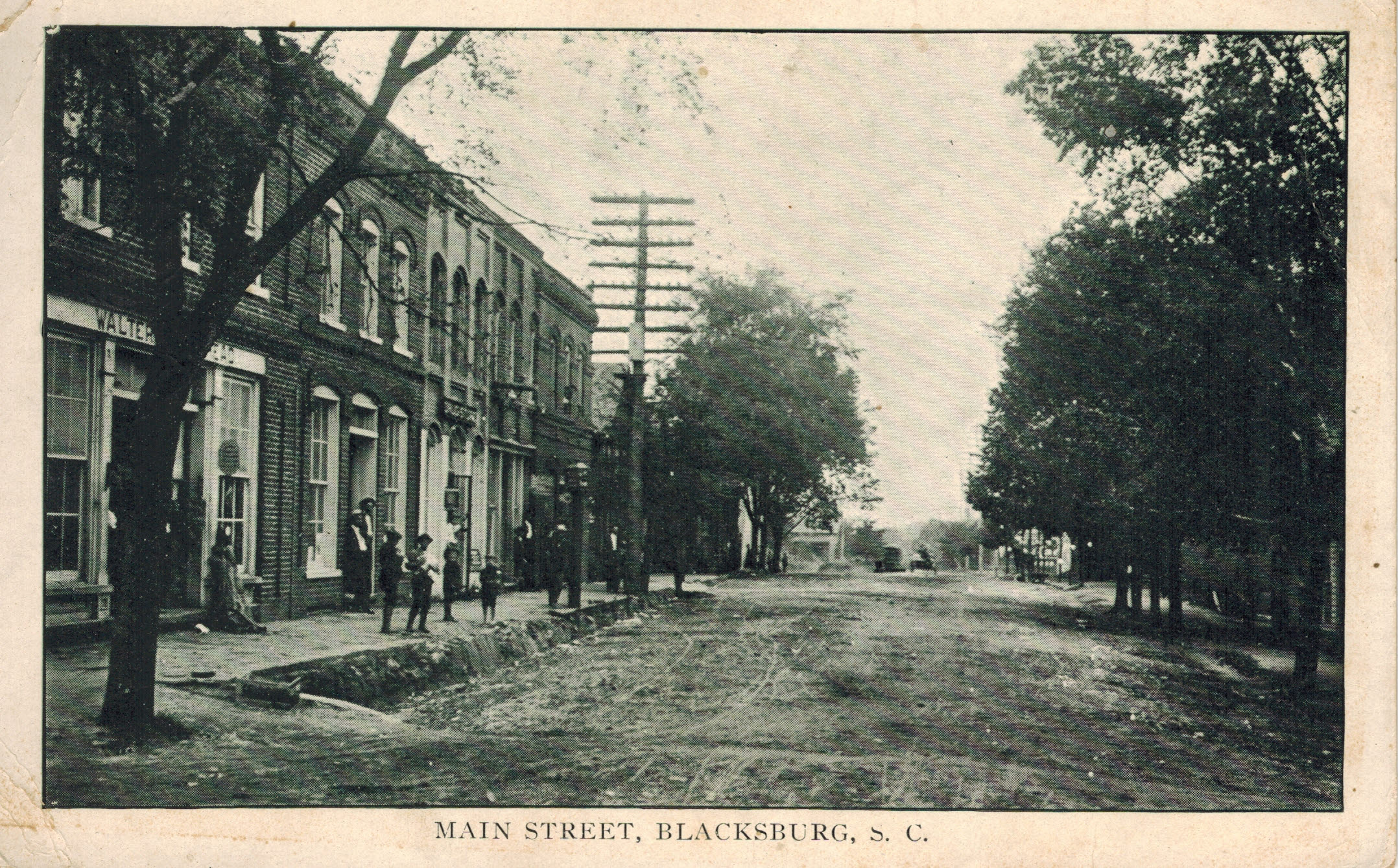 Postcard view of North Shelby Street: the Turner's Grocery store once stood just beyond the view as shown on the postcard. Courtesy of the Turner Postcard Collection - 2023
