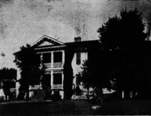 Historic Dunovant house prior to its move to Smith Street.