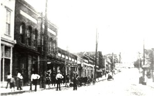Early image of Gadsden St., showing the an unpaved commercial district. Image courtesy of the CDGS.
