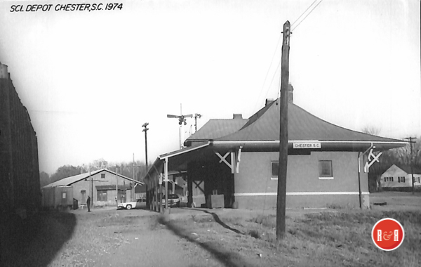 Note the freight depot is just beyond the passenger depot.  Courtesy of the AFLLC Collection - 2017
