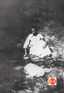 Belle and Em on the front porch of Cedarhurst and dipping water from the Big Spring at Cedarhurst. Courtesy of the Floyd Collection - 2013