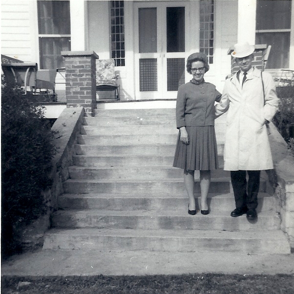 Virginia Wylie and her brother Franklin Wylie on the front steps of Cedarleaf.