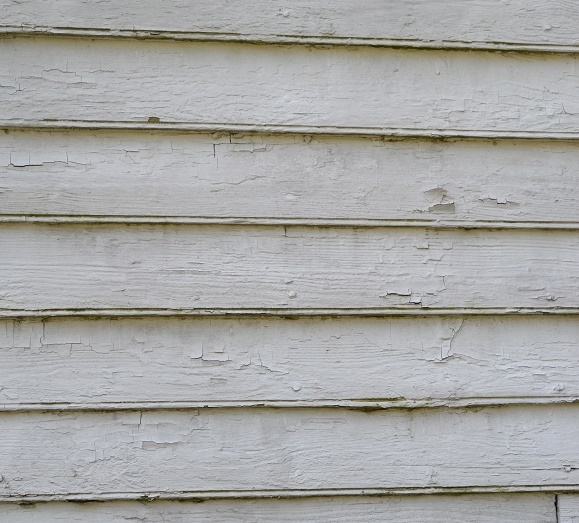 Hand planned siding from the original cabin. Note the forged nail heads on the left side of the planking.