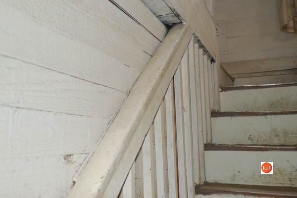 The stairs to the second floor were originally open to the parlor below but in the late 19th century a board wall enclosed the area. This was most likely the same time new panel doors and other updates were made to he home.