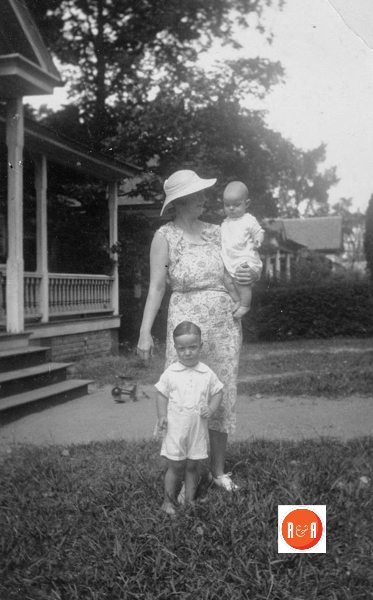 Mamie Lathan Moore and baby Edward Moore in arms.