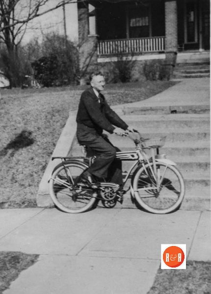Albert Torbit Henry on his bicyle on Columbia Street.