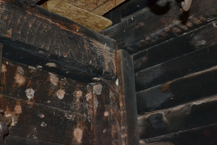 It appears the rear kitchen was heavily used and smoked up during the period in which it served. The ceiling and most interior walls had been removed leaving some of the plaster lathing and molding around the door frames.