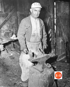 Unidentified blacksmith working in his shop, ca. 1900. Courtesy of the CDGS - 2012