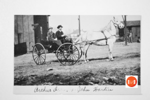 Image of John Harden and companion with a prized buggy horse.