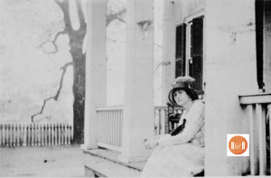 Nan Neil on the front steps of her home. Image courtesy of the Van Center Collection, ca. 1910.