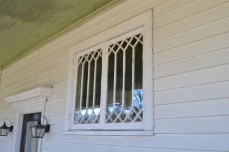 This window is the same one that shows in the early 20th century image of Patsie D. McLeod – see below.