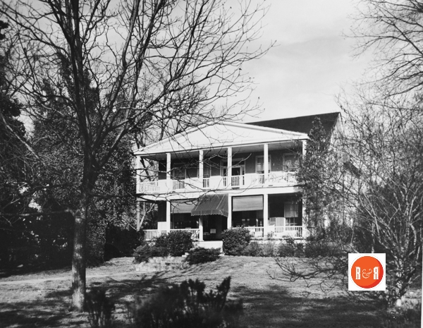 The Cathcart home is just to the left of the Doty house, (the Songbird Inn) in this early 20th century photograph. [Van Center Collection]