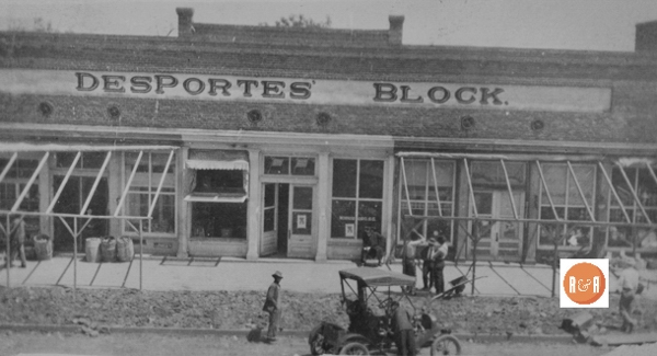 Early 20th century view of the Desportes Block stores under construction. Note the architecture and facade has been drastically changed. Courtesy of the Van Center Collection. The image of the horse on display is courtesy of the Kirkpatrick Collection - 2018