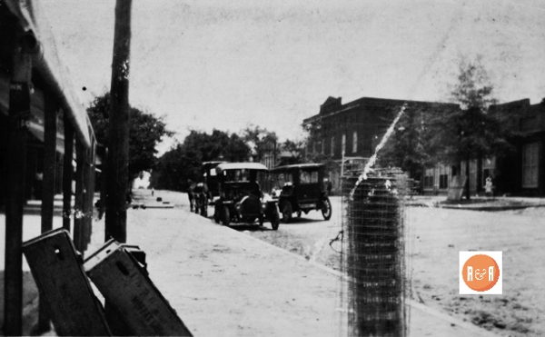 View of South Congress taken of the south side of the street in circa 1912 including the Norman Building in the background. Courtesy of the Van Center Collection