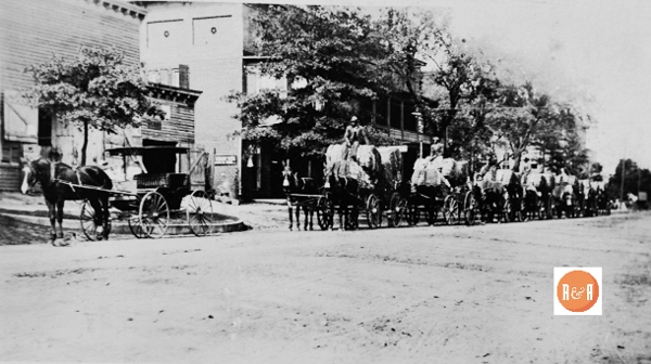 Cotton wagons hauling bales to market pictured along South Congress Street, ca. 1910. Courtesy of the Van Center Collection