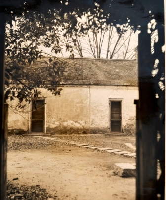 Early view of the domestic quarters behind the Neil house.