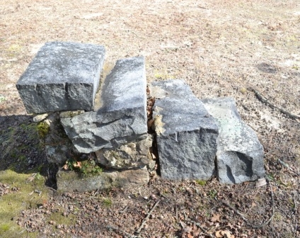 Mounting stone in front of the church.