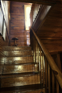 View of the rich pine interior walls and architectural detail of the historic home - 2013.
