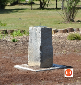 One of the original foundation rocks for the home was used in the garden as the base of a sundial.