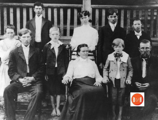 Park Family in 1900 – One of the young men in photo was Margaret Park Sander’s father. The traveling photographer came through the area and note that while everyone put on their good clothes, the young boys didn’t make it into any shoes!