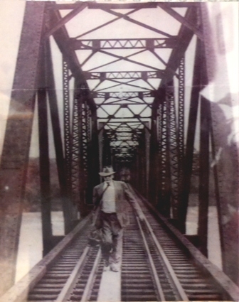 Beloved Dr. Pinner crossing the Broad River on the railroad trestle as he serves both sides of the river.