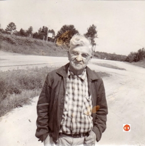 Mr. Claude Hunter Ragsdale, Sr., standing in front of his store.