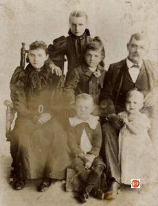 Here’s another photo of the earlier group while probably still in Jenkinsville about 1895. John Knox & Minnie McMeekin Ragsdale (parents), Ruby (top), Claude (center), John Roger (bottom), & Helen Elise Ragsdale (little girl born 08-1893). J.K. & Minnie had two more kids after moving to Blairs.