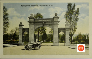 Impressive gate entrance to the cemetery. Courtesy of the Willis Postcard Collection - 2016