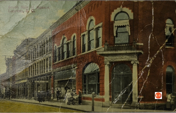 LCPL Post Card Collection – The Peoples Loan and Exchange Bank; Davis and Roper Company, Inc.; W. C. Wilson Company; and the H. Terry Store were some of the establishments located on the south side of the Laurens Court House Square. Dr. CL Albright, a dentist, had an office above the Peoples Loan and Exchange Bank on the second floor. Information from: Laurens Co Postcard Series, LCMA, Arcadia Publishing – 2007