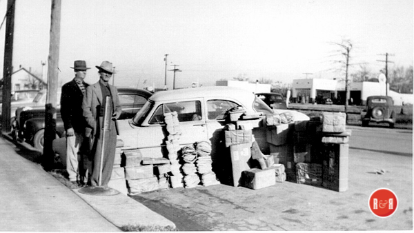 Munch Henderson watches rural postal deliveries being loaded by Jeter Owings and Leon Yeargin. Residents fondly recall Munch’s singing and sweeping in Gray Court’s downtown.
