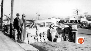 Jeter Owings and Leon Yeargin with stacked mail ready for rural delivery. Many recall Munch Henderson working on Main Street, singing and sweeping.