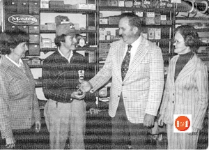 Mary Lou and Gray Rapley Curry received the keys to Gentry Hardware Company from Bill and Nell Harris Gentry in 1976.