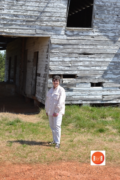 Dianne Culbertson of the Gray Court – Owings Historical Society stands in front of her grandfather’s barn.