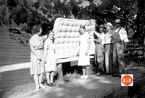 Mrs. Mae Stoddard and Mrs. “T” Owings show off the first mattress made in Laurens County in the 1930’s.