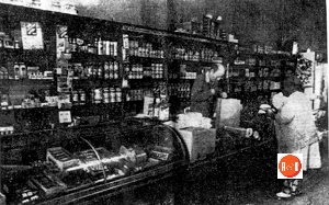 Interior view of the Stoddard store operated by Bill Hendricks. The customer in the image is Laura Barksdale.