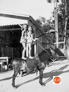 Sarah Jane Limehouse and Ginger Limehouse on their pony, Buddy.