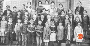 Central School near Martin’s Cross Roads in 1937 with teachers, Virginia Gray Griffin and Mae Roper Rhodes. Pictured on the top row are: Bertha Bowman, Ruth Hunter, Elizabeth Poole and Carrie Lee Lawson, 2nd Row – Landrum Kennedy, Charlie Bowman, Allen Owens, Carl Poole, Etta Holcombe, Fances Scott, Madge Kennedy, Margaret Knight, Mar Kate Pool and Ruth Garrett, 3rd Row from top – J.W. Owens, Allen Kennedy, Glen Martin Jr, Maxcy Hunter, Euel Garrett, J.W. Weathers, Joni Edgin, Link Kennedy, and Blanch Parson, 4th Row from top – Mary Sue Lawson, Edna Hunter, Mitchell Knight, Pink Edgin, UN, Herman Knight, UN, Lillie Edgin, Dorothy Dot Stewart, Madge Stewart and Letha Kennedy.