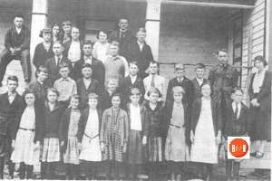 Undated picture of students at the Green Pond School. First row (L-R) Mary Smith, Mable Woods, Wilma Burdette (Power), Kathleen Willis, Nevia Graydon, Lon Taylor, Ruth Woods, Mary Gray, Marie Putman and Car Kellett, 2nd Row – Raplh Peden, Clarence Lyons, George Woods, Tillman Tumblin, Louise Woods, Harry Stone, Carl Taylor, Franklin Chapman, Harry Kellet, Pearl Brannon (Teacher), Eugene Johnson (Teacher), 3rd Row – Albert Gray, Jimmy Collins, Bryon Putman, 4th Row – Gladys Lyons, Nell Taylor, Beatrice Curry, John Robert Woods, 5th Row – Guy Mahon, Willie Mae Curry, Lillian Watts and Posey Hipp.