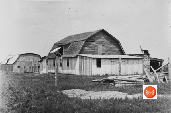 Milk Room at the Cooper Farm – It was here that the milk was cooled and separated for sterilization and bottling.
Cooper farm building and barns.  Note the rock silo to the right edge of the barn.