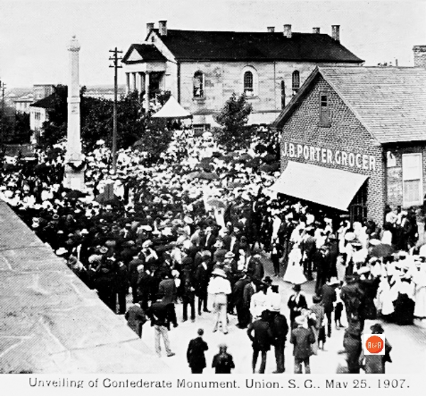 Unveiling of the monument in 1907. Notice Porter’s Grocery company on West Main Street.
