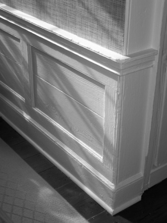 Handsome wainscoting was used throughout much of the house on both the first and second floors.