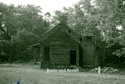 Bratton cabin as it appeared in the early 1970’s as restoration work on the foundations and chimney repairs began.