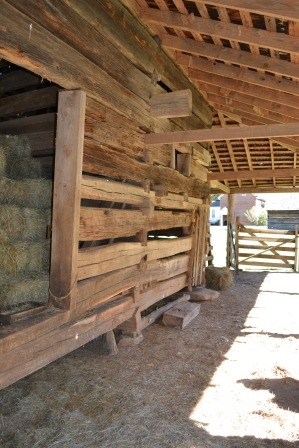 Barn inteior showing the complex log structure.