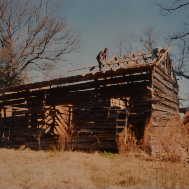 McGill barn being carefully disassembled by volunteers, including Rusty Robinson, Roots and Recall’s co-founder, for relocation for interpretive purposes to Historic Brattonsville.
